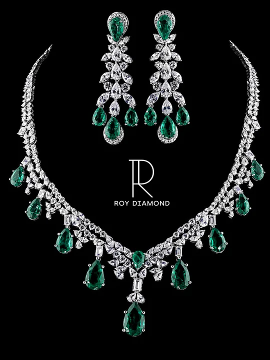 Emerald green and white diamond necklace and earrings set